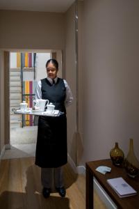 Členové personálu v ubytování Escalus Luxury Suites Verona