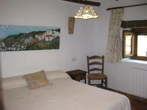 Postel nebo postele na pokoji v ubytování Reul Alto Cortijos Rurales