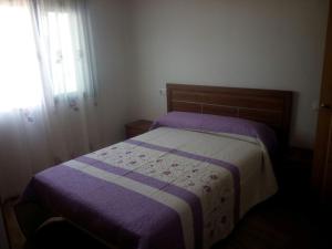 Ένα ή περισσότερα κρεβάτια σε δωμάτιο στο Salomé Beach Apartments