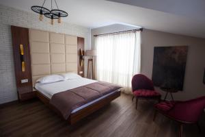 Postel nebo postele na pokoji v ubytování Maxuite Hotel in Home + 33 fotografií