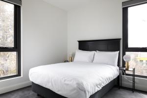 Ein Bett oder Betten in einem Zimmer der Unterkunft Knightsbridge Canberra