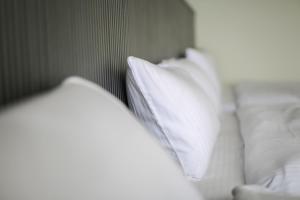 Postel nebo postele na pokoji v ubytování Bo Heng B&B