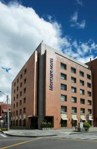 a large brick building with the word hotel on it at Mercure Bogota BH Zona Financiera in Bogotá