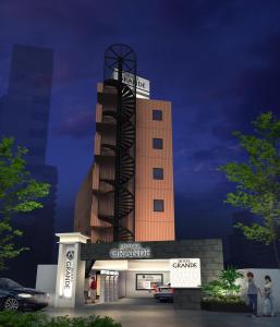 a rendering of a building with people standing in front of it at Hotel Grande (Love Hotel) in Kitakyushu