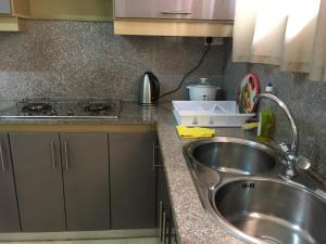 Η κουζίνα ή μικρή κουζίνα στο BR Apartment & Studios +86 φωτογραφίες