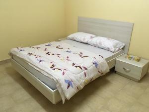 Ένα ή περισσότερα κρεβάτια σε δωμάτιο στο BR Apartment & Studios