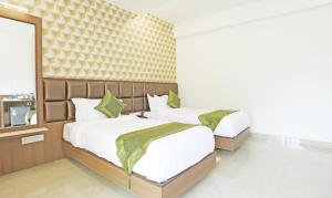 Letto o letti in una camera di Treebo Pechis Castle