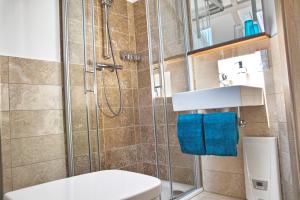 Koupelna v ubytování Kragemann Hotel & Vinothek + 34 fotografií