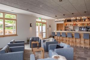 Posezení v ubytování Hartungs Hoteldorf