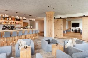 Posezení v ubytování Hartungs Hoteldorf