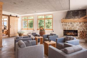 Posezení v ubytování Hartungs Hoteldorf