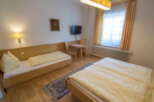 Postel nebo postele na pokoji v ubytování Triebenerhof