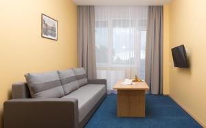 TV a/nebo společenská místnost v ubytování Daina Jurmala Beach Hotel