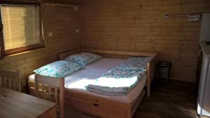 Postel nebo postele na pokoji v ubytování Chata Nový Přerov