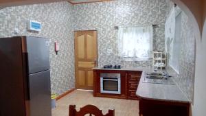 Kuchyň nebo kuchyňský kout v ubytování Green Garden Self catering 1 + 7 fotografií