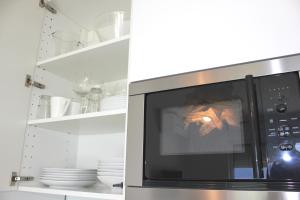 Küche/Küchenzeile in der Unterkunft Studio apartment Miramare