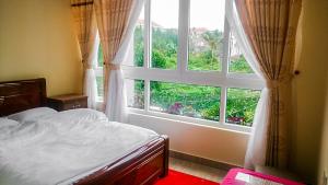 Postel nebo postele na pokoji v ubytování ATP Guesthouse