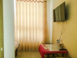 TV a/nebo společenská místnost v ubytování ATP Guesthouse