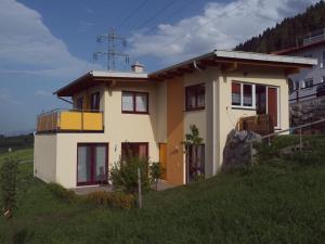 a small house on top of a hill at Ferienhaus Sam in Innsbruck