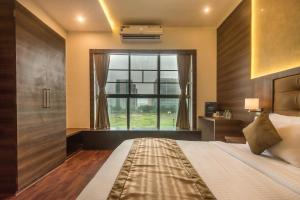 Ένα ή περισσότερα κρεβάτια σε δωμάτιο στο Hotel BKC Inn - Near Trade Center, Visa Consulate BKC +63 φωτογραφίες