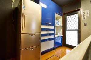 Kuchyň nebo kuchyňský kout v ubytování Guesthouse Nijo Fukuro-Tei
