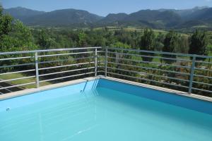 a balcony with a view of the mountains at Alberg la Bruna in Bellver de Cerdanya 