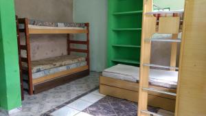 Una cama o camas en una habitación de Pousada Tutubarao