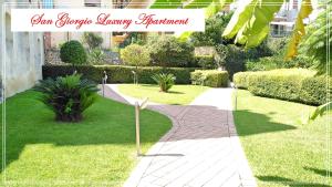 Vonkajšia záhrada v ubytovaní San Giorgio Luxury Apartment Taormina-Panoramic Pool & Parking Space