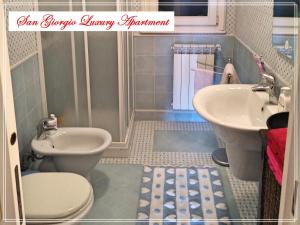 Kúpeľňa v ubytovaní San Giorgio Luxury Apartment Taormina-Panoramic Pool & Parking Space
