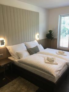 Katil atau katil-katil dalam bilik di Hotel Bartoš
