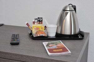 Set per la preparazione di tè e caffè presso Authentic by balladins Dijon / Marsannay-la-Côte