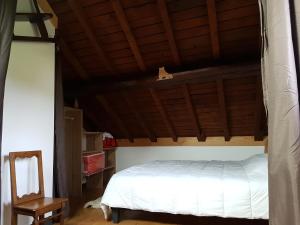 Postel nebo postele na pokoji v ubytování spa et sauna