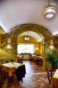 Reštaurácia alebo iné gastronomické zariadenie v ubytovaní Villa Aurora
