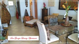 Posedenie v ubytovaní San Giorgio Luxury Apartment Taormina-Panoramic Pool & Parking Space