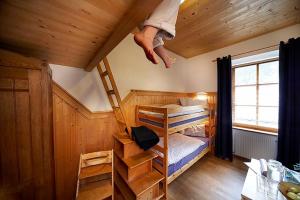 Posteľ alebo postele v izbe v ubytovaní Gabis Lodge