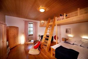 Posteľ alebo postele v izbe v ubytovaní Gabis Lodge
