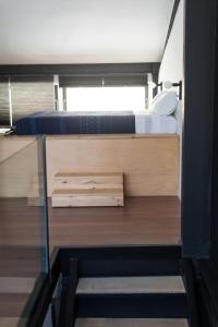 Postel nebo postele na pokoji v ubytování Bubusuites