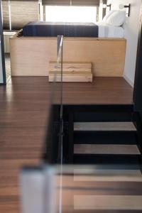 Postel nebo postele na pokoji v ubytování Bubusuites
