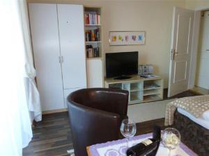 A television and/or entertainment centre at See:Zeit Das_Ferienhaus