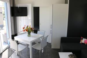 TV a/nebo společenská místnost v ubytování Stadscamping Zeeland