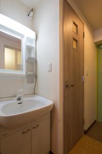 Koupelna v ubytování Hotel Asahi Grandeur Fuchu
