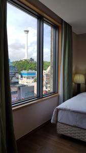 Postel nebo postele na pokoji v ubytování Stanford Hotel Busan