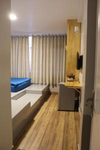 Postel nebo postele na pokoji v ubytování DaLat Sky Hostel
