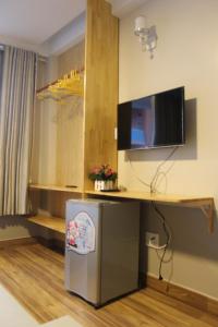 TV a/nebo společenská místnost v ubytování DaLat Sky Hostel