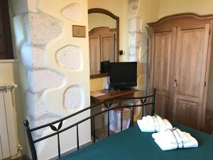 TV a/nebo společenská místnost v ubytování B&B Casa Mila'