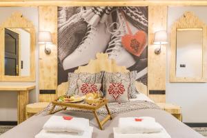 Łóżko lub łóżka w pokoju w obiekcie Apartament Owcze Runo Zakopane