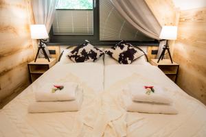 Łóżko lub łóżka w pokoju w obiekcie Apartament Owcze Runo Zakopane