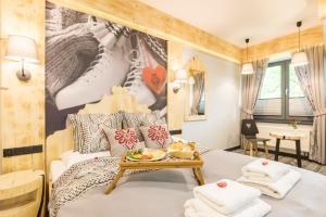 Łóżko lub łóżka w pokoju w obiekcie Apartament Owcze Runo Zakopane