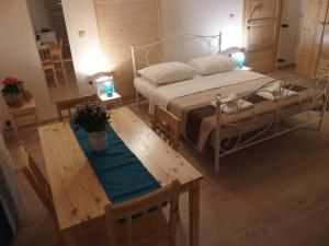 מיטה או מיטות בחדר ב-Guesthouse Casetta Verde