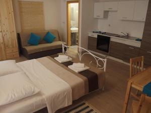 Postel nebo postele na pokoji v ubytování Guesthouse Casetta Verde
